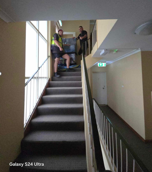 Upright piano removal from stairs in Sydney